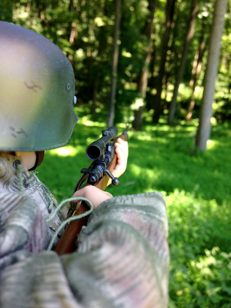 closeup of figure aiming